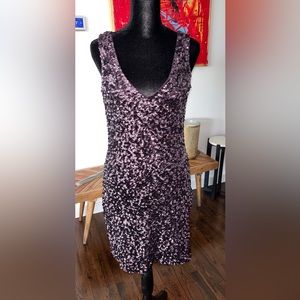 Purple form fitted sequined dress. Never worn. Smoke free home.